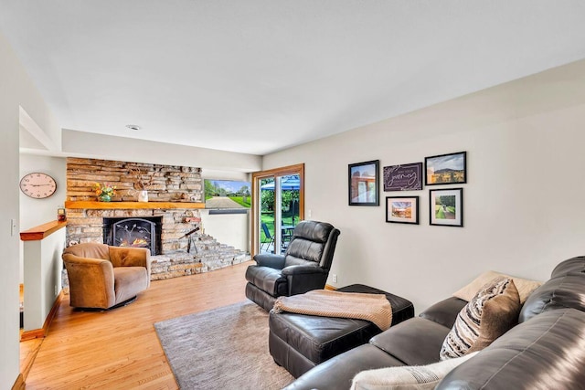 4619 Stonebridge Dr, Racine, WI 53404 - living room with light wood finished floors and a fireplace