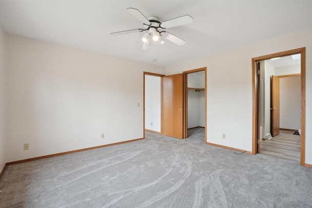 119 White St, Benton, WI 53803 - unfurnished bedroom featuring light carpet, baseboards, and a spacious closet
