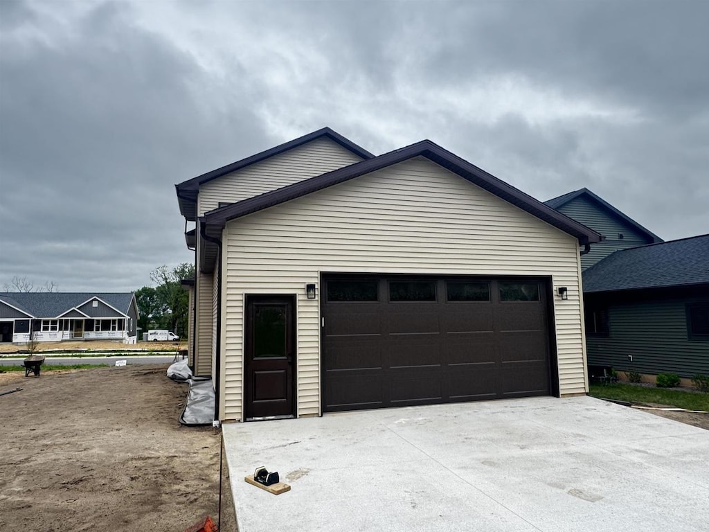 452 Gunderson Dr, Portage, WI 53901 - garage featuring concrete driveway