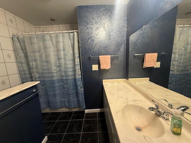 228227 County Road Y, Birnamwood, WI 54414 - bathroom featuring tile patterned floors, vanity, tile walls, and curtained shower