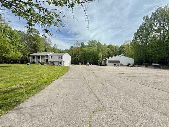 228227 County Road Y, Birnamwood, WI 54414 - view of asphalt driveway featuring a view of trees