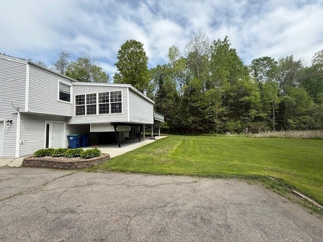 228227 County Road Y, Birnamwood, WI 54414 - view of side of home featuring a lawn