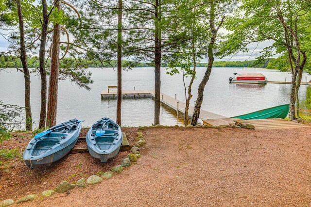 1948 Wild Life Ln, Eagle River, WI 54521 - view of yard featuring a water view and a dock