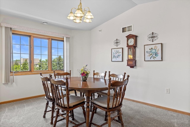267 Oconomowoc Pkwy, Oconomowoc, WI 53066 - carpeted dining area featuring a chandelier and baseboards