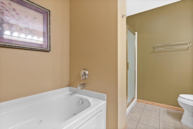 267 Oconomowoc Pkwy, Oconomowoc, WI 53066 - bathroom with tile patterned flooring, a shower stall, a jetted tub, and toilet