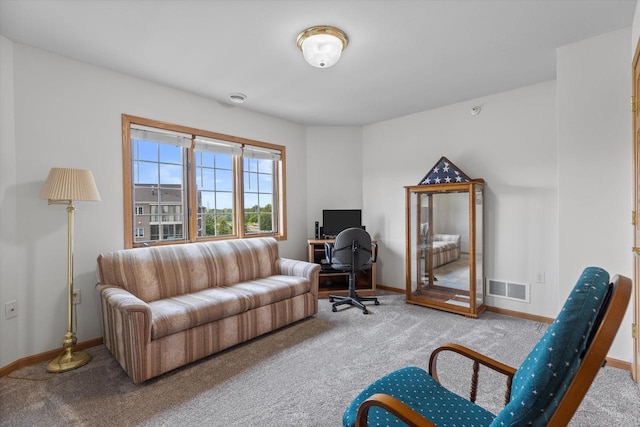 267 Oconomowoc Pkwy, Oconomowoc, WI 53066 - carpeted living area featuring baseboards and an office area