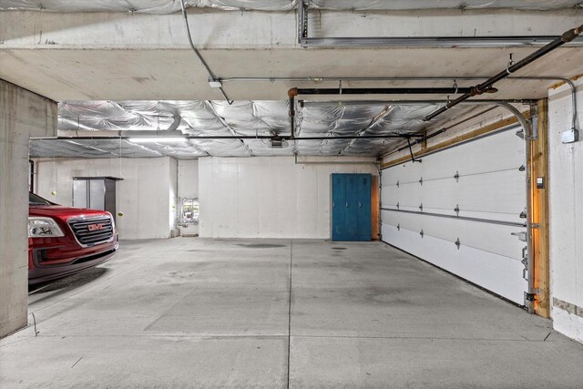 267 Oconomowoc Pkwy, Oconomowoc, WI 53066 - garage with a garage door opener