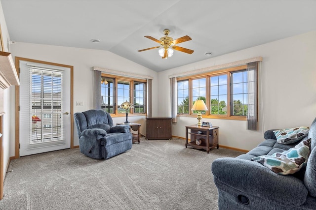 267 Oconomowoc Pkwy, Oconomowoc, WI 53066 - carpeted living area featuring lofted ceiling, ceiling fan, and baseboards