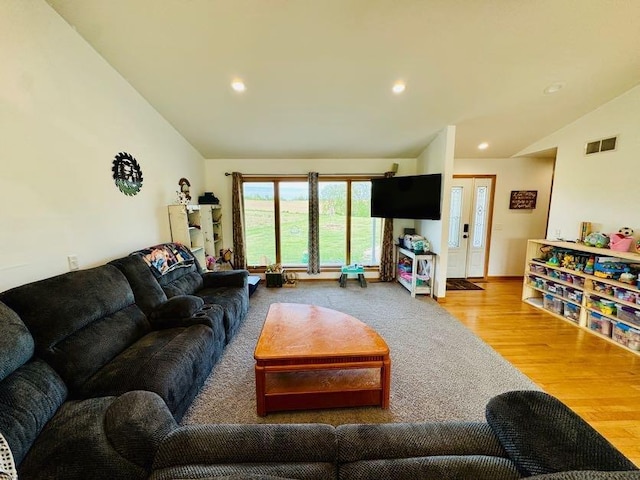 N5893 Walnut Rd, Monticello, WI 53570 - living room featuring lofted ceiling, wood finished floors, and recessed lighting
