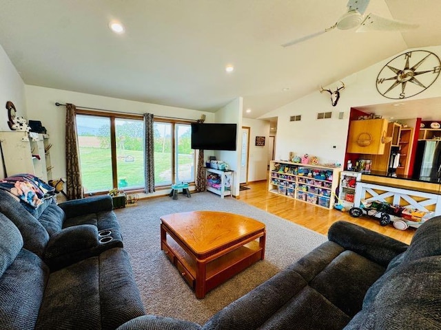 N5893 Walnut Rd, Monticello, WI 53570 - living area featuring vaulted ceiling, wood finished floors, and recessed lighting
