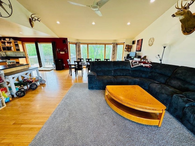 N5893 Walnut Rd, Monticello, WI 53570 - living room featuring lofted ceiling, wood finished floors, and recessed lighting
