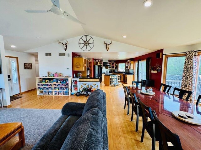 N5893 Walnut Rd, Monticello, WI 53570 - living room featuring vaulted ceiling, light wood finished floors, recessed lighting, and a ceiling fan