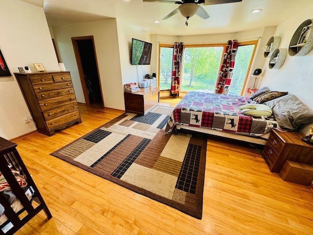 N5893 Walnut Rd, Monticello, WI 53570 - bedroom with access to exterior, light wood-style floors, ceiling fan, and recessed lighting