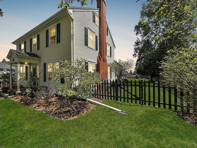view of home's exterior with a chimney