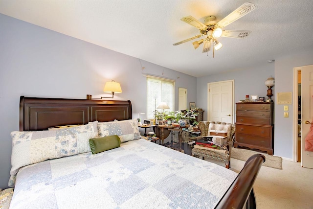14 Golf Course Rd, Madison, WI 53704 - bedroom featuring carpet flooring, ceiling fan, and a textured ceiling