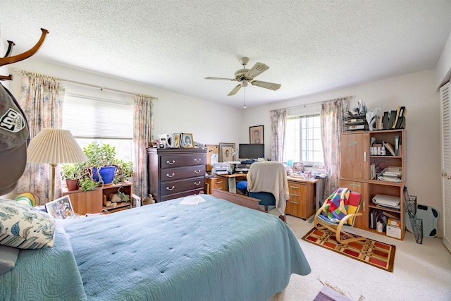 14 Golf Course Rd, Madison, WI 53704 - bedroom featuring carpet floors, a textured ceiling, a ceiling fan, and a desk