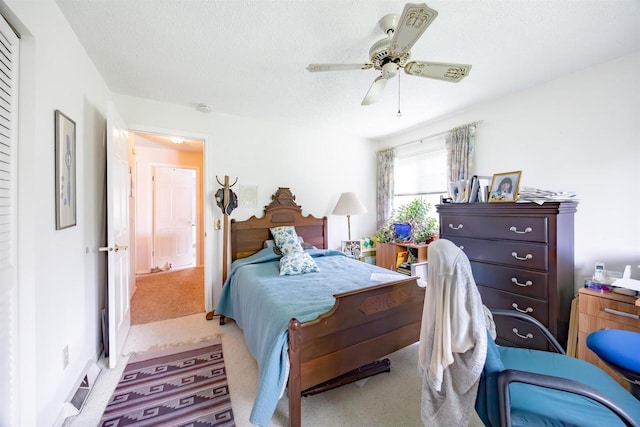 14 Golf Course Rd, Madison, WI 53704 - carpeted bedroom with a ceiling fan and a textured ceiling