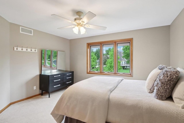 1816 Blue Ridge Trl, Waunakee, WI 53597 - bedroom with light colored carpet, baseboards, and ceiling fan
