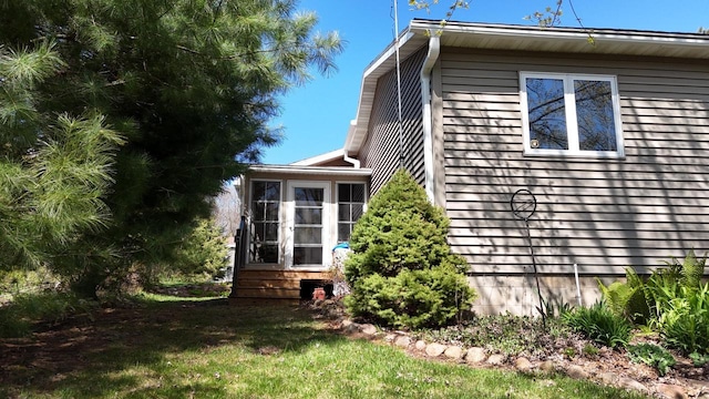 N1423 Silver Canoe Rd, Keshena, WI 54135 - view of home's exterior with a yard