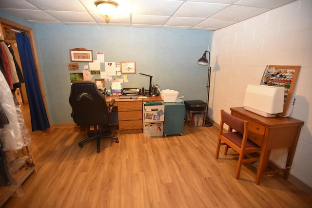 N1423 Silver Canoe Rd, Keshena, WI 54135 - office space featuring a drop ceiling, light wood-type flooring, and concrete block wall