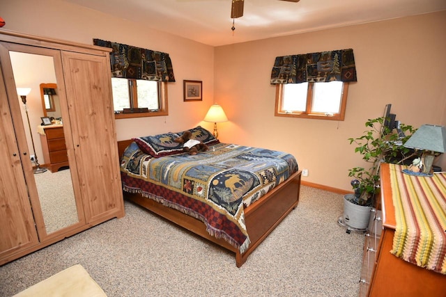 N1423 Silver Canoe Rd, Keshena, WI 54135 - bedroom featuring carpet, baseboards, and a ceiling fan