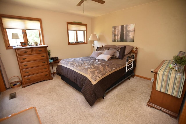 N1423 Silver Canoe Rd, Keshena, WI 54135 - bedroom featuring light carpet and a ceiling fan