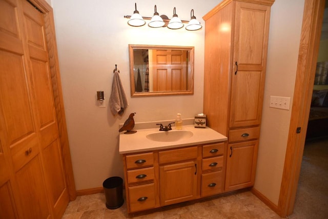 N1423 Silver Canoe Rd, Keshena, WI 54135 - ensuite bathroom featuring vanity and baseboards