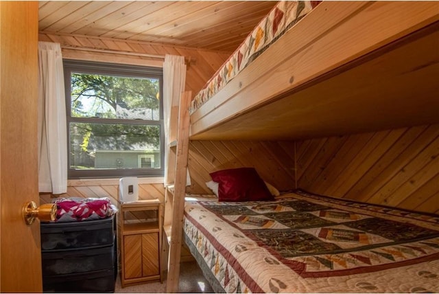 601 Idlewild St Unit 104, Balsam Lake, WI 54810 - bedroom featuring wooden ceiling and wood walls