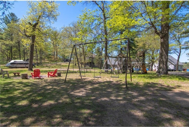601 Idlewild St Unit 104, Balsam Lake, WI 54810 - view of playground featuring a lawn