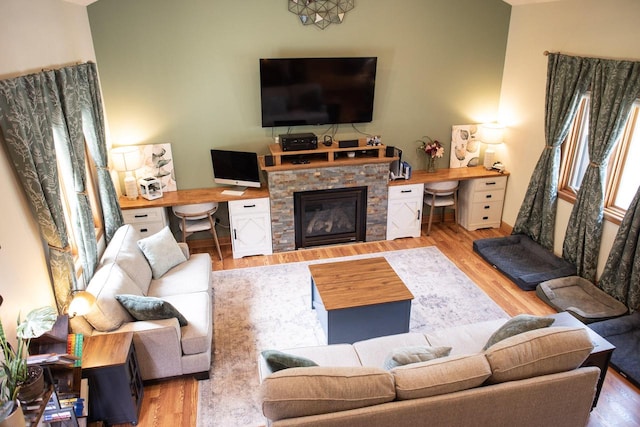 23718 Emblem Ave, Tomah, WI 54660 - living room featuring wood finished floors, an office area, and baseboards