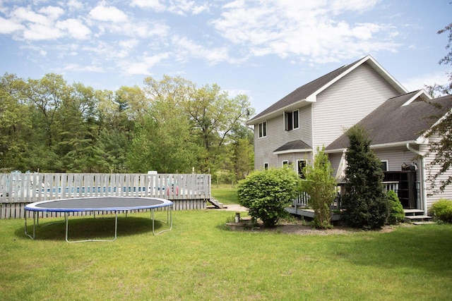 23718 Emblem Ave, Tomah, WI 54660 - view of green lawn with a wooden deck