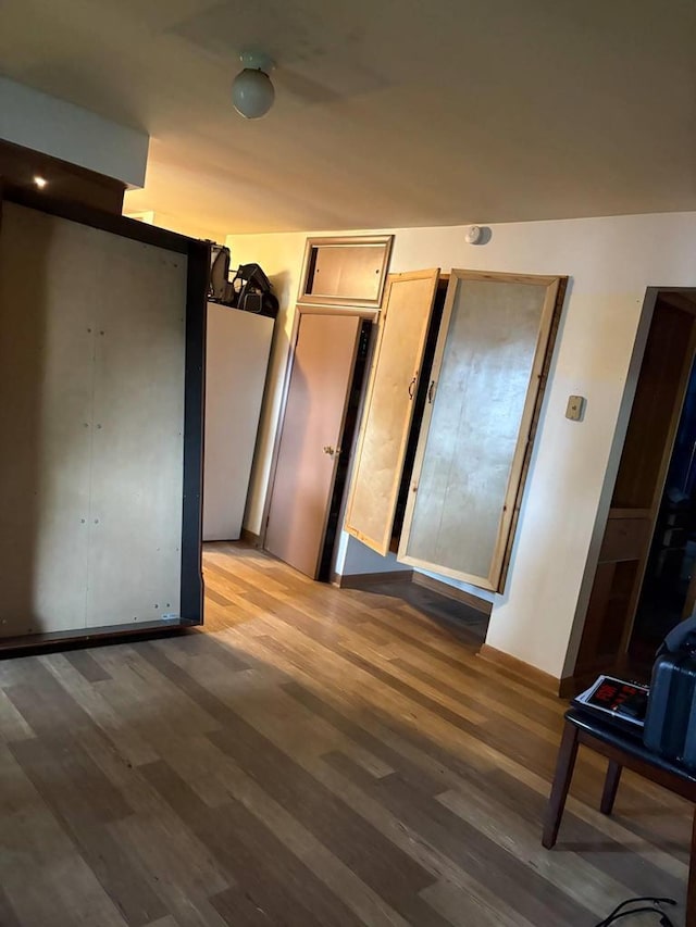916 Fayette Ave, Rib Lake, WI 54470 - unfurnished bedroom featuring light wood-style flooring and baseboards