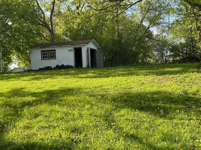 916 Fayette Ave, Rib Lake, WI 54470 - view of grassy yard featuring an outdoor structure