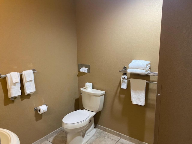 2411 River Rd Unit 2443, Wisconsin Dells, WI 53965 - bathroom featuring toilet, tile patterned floors, and baseboards