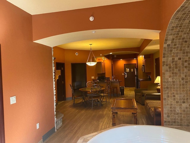 2411 River Rd Unit 2443, Wisconsin Dells, WI 53965 - dining room featuring wood finished floors and baseboards