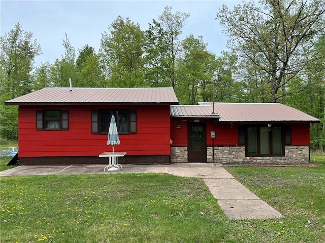 W4670 County Highway F, Springbrook, WI 54875 - view of front of home with a front yard and metal roof