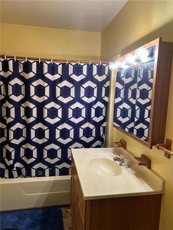W4670 County Highway F, Springbrook, WI 54875 - bathroom featuring vanity and shower / bath combo