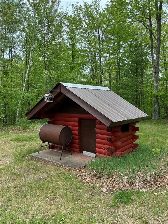 W4670 County Highway F, Springbrook, WI 54875 - view of outdoor structure with a wooded view