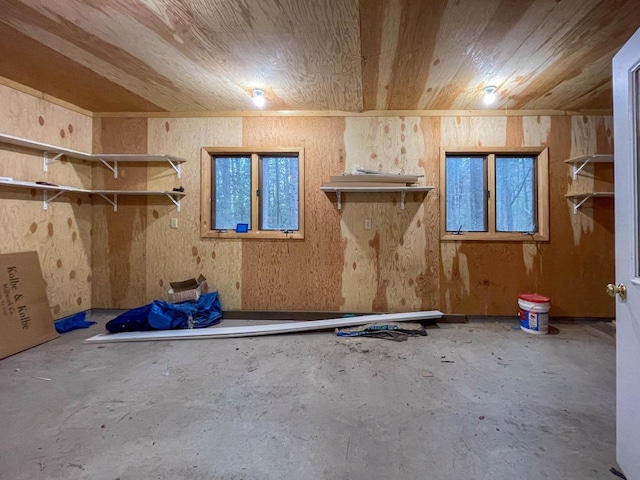 8395 Woolpy Dr, Minocqua, WI 54548 - miscellaneous room featuring unfinished concrete floors and wooden ceiling