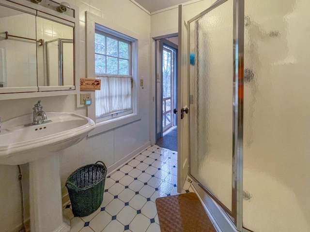 8395 Woolpy Dr, Minocqua, WI 54548 - full bathroom featuring a stall shower and tile patterned floors