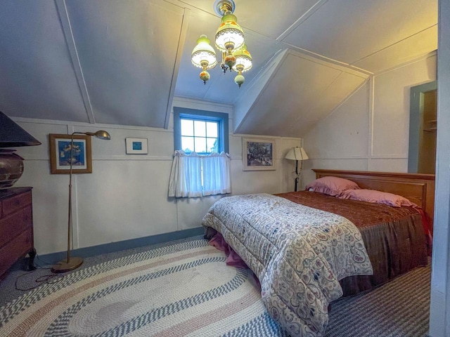 8395 Woolpy Dr, Minocqua, WI 54548 - carpeted bedroom with vaulted ceiling and a decorative wall