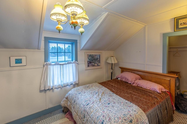 8395 Woolpy Dr, Minocqua, WI 54548 - bedroom featuring a decorative wall, lofted ceiling, a chandelier, and carpet flooring