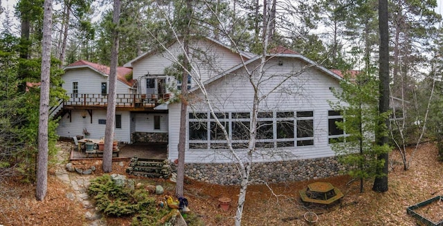 8395 Woolpy Dr, Minocqua, WI 54548 - back of house with a wooden deck