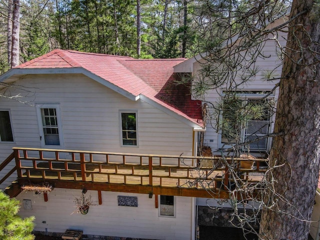 8395 Woolpy Dr, Minocqua, WI 54548 - view of property exterior with a shingled roof