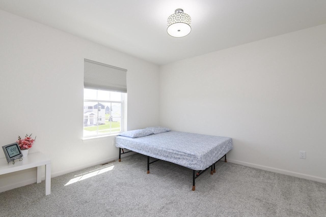 W242N5663 Simona Dr, Sussex, WI 53089 - carpeted bedroom with baseboards