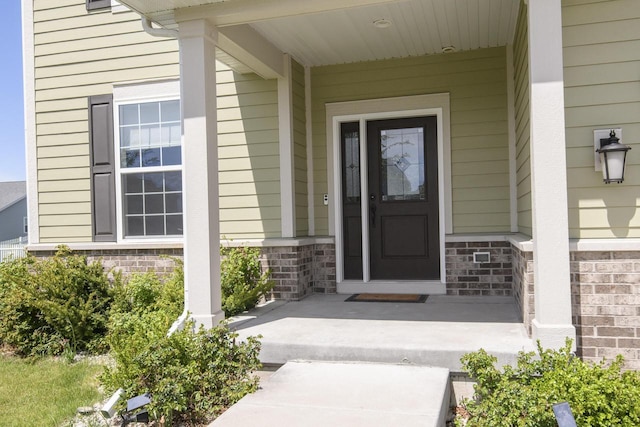 W242N5663 Simona Dr, Sussex, WI 53089 - property entrance featuring a porch