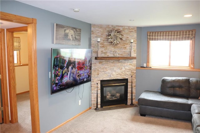 3530 Briarcrest Dr, Eau Claire, WI 54701 - carpeted living room featuring a fireplace and baseboards