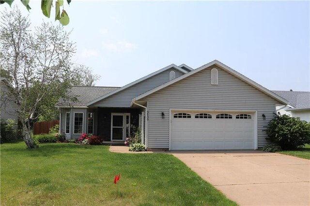 3530 Briarcrest Dr, Eau Claire, WI 54701 - ranch-style home featuring an attached garage, driveway, and a front lawn