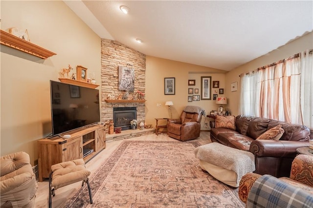 18886 53rd Ave, Chippewa Falls, WI 54729 - living area featuring vaulted ceiling and a stone fireplace