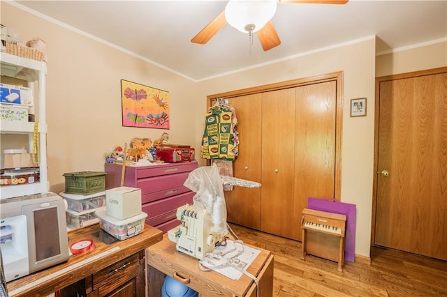18886 53rd Ave, Chippewa Falls, WI 54729 - home office featuring ceiling fan, light wood-style floors, and crown molding